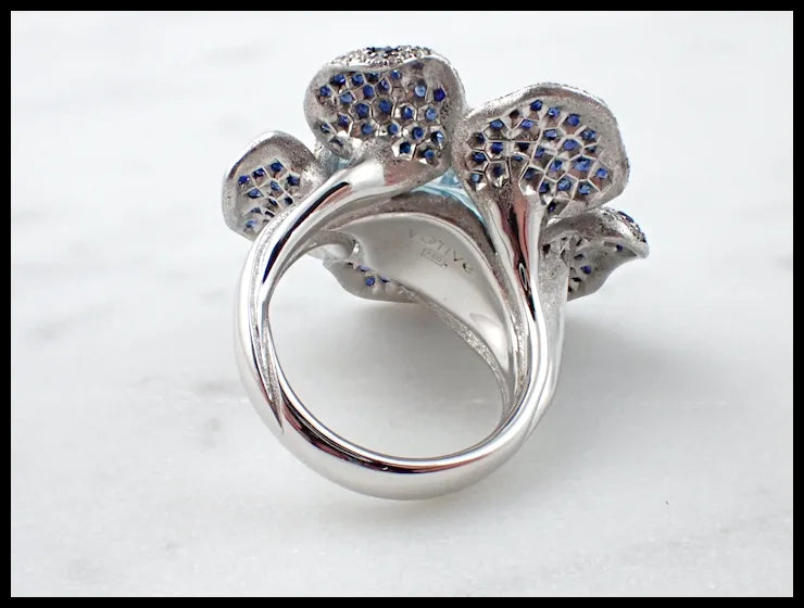 Flower Theme Ring in 18K White Gold with Diamonds, Blue Sapphires, Orange Sapphire and Uncut Aquamarine