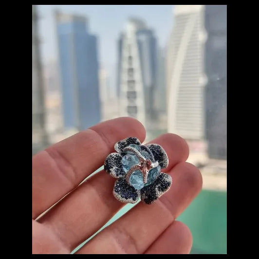 Flower Theme Ring in 18K White Gold with Diamonds, Blue Sapphires, Orange Sapphire and Uncut Aquamarine