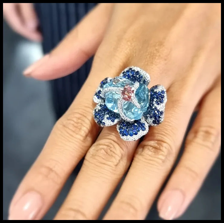 Flower Theme Ring in 18K White Gold with Diamonds, Blue Sapphires, Orange Sapphire and Uncut Aquamarine