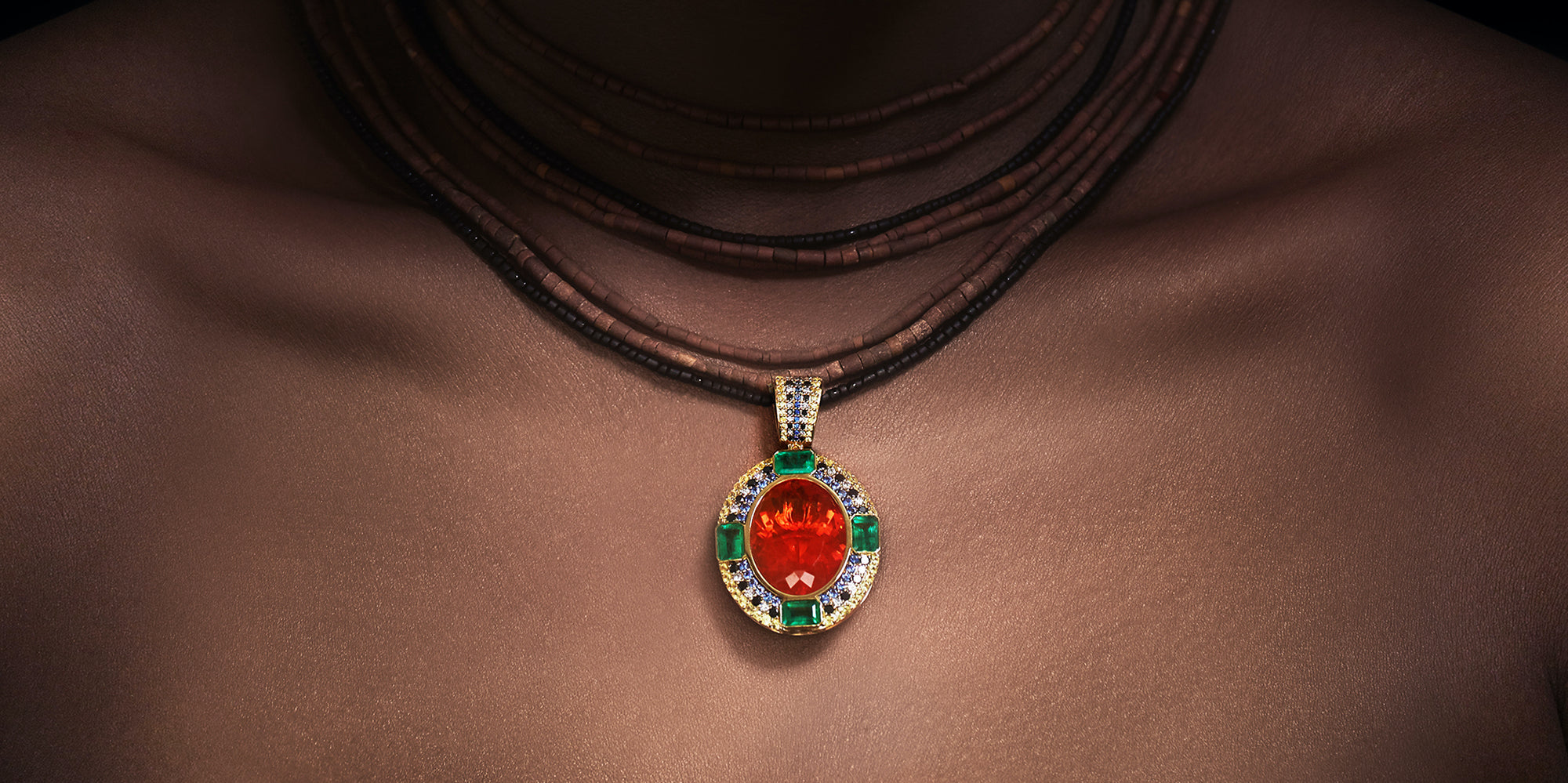 Pendant with fire opal from Mexico, diamonds, and emeralds